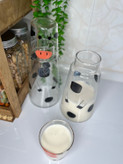 بطری شیر شیشه ای تاپ هوم طرح گاوه همراه لیوان